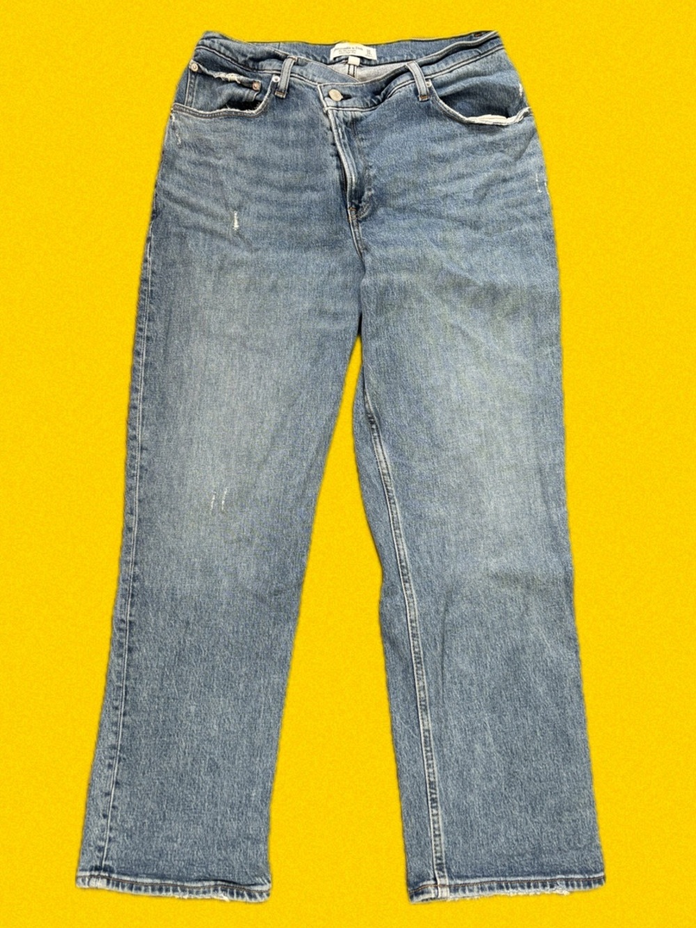 Asymmetrical Button Light Wash Denim Jeans